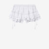 Puria Short Fustă-pantalon din bumbac cu volane și dantelă florală Puria Short Fustă-pantalon din bumbac cu volane și dantelă florală